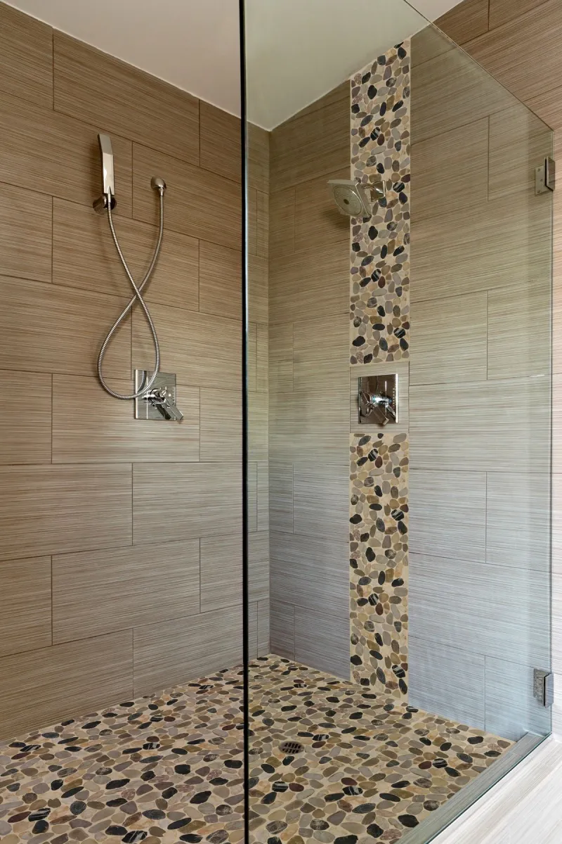 Stylish bathroom with textured wall tiles