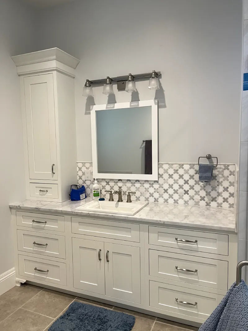 Elegant bathroom featuring marble countertop