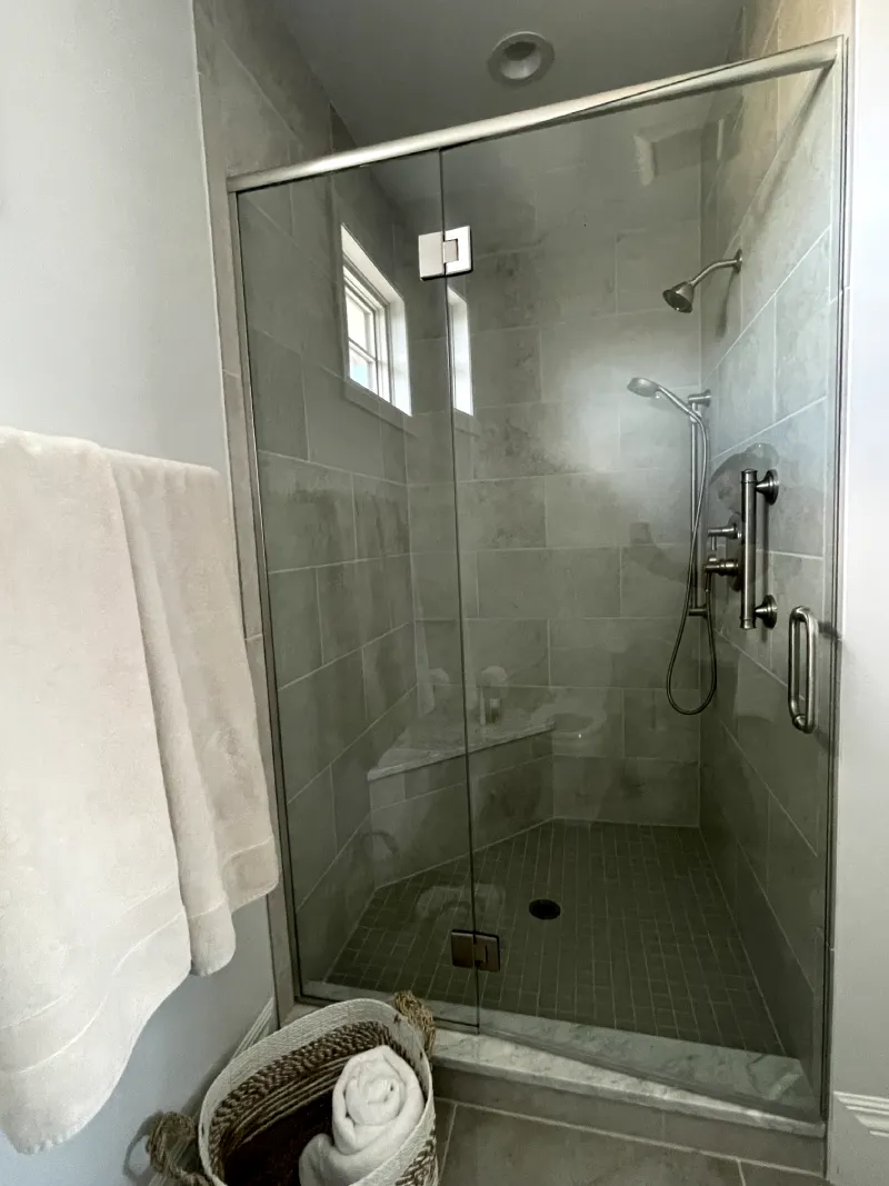 Minimalist shower design with glass door