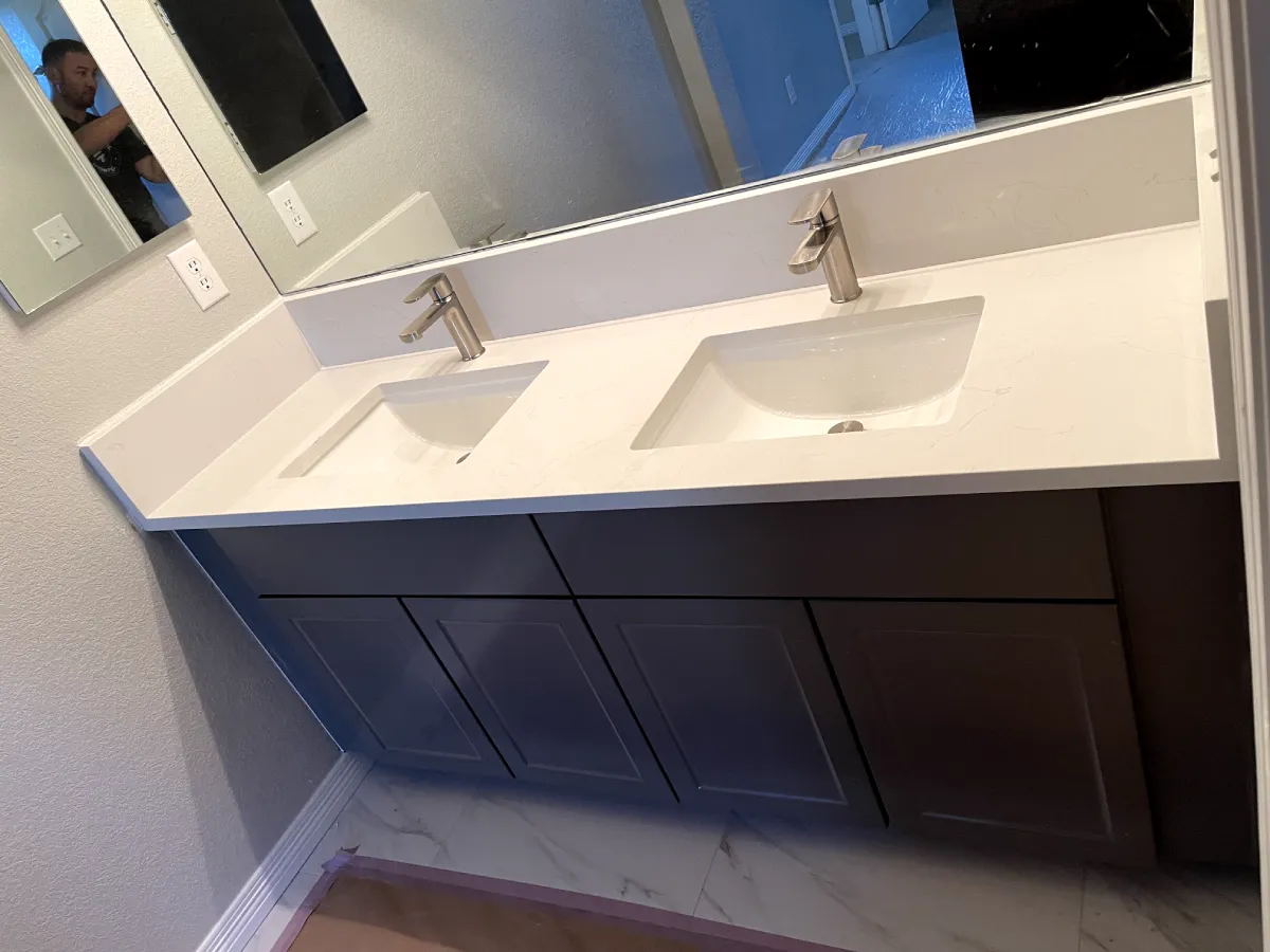 Contemporary bathroom with dual faucets