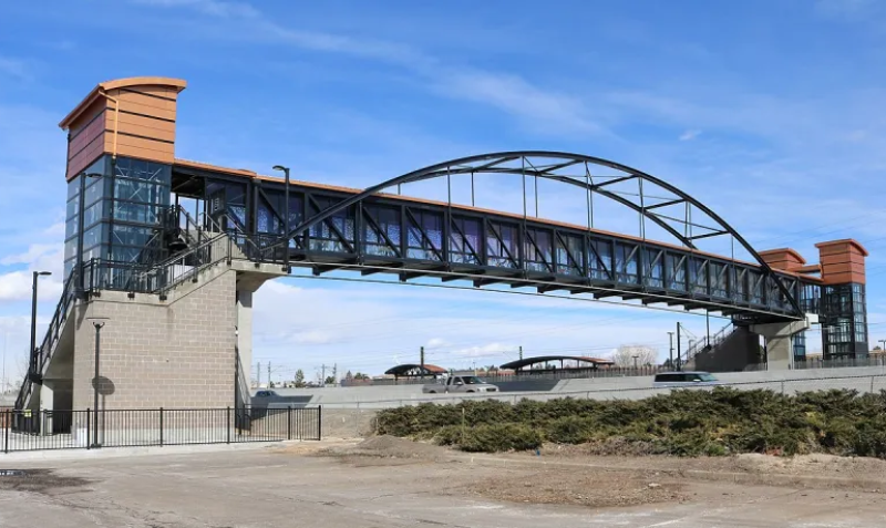 Arched walkway over highway