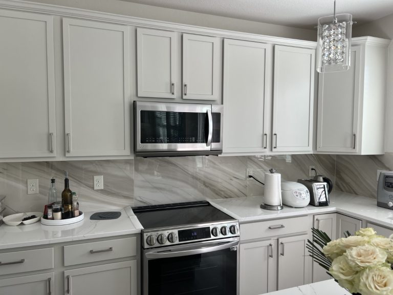 Elegant kitchen with marble backsplash