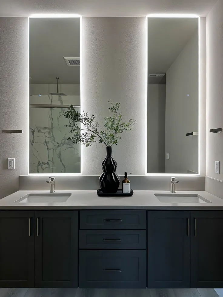 Elegant bathroom decor with vase and greenery